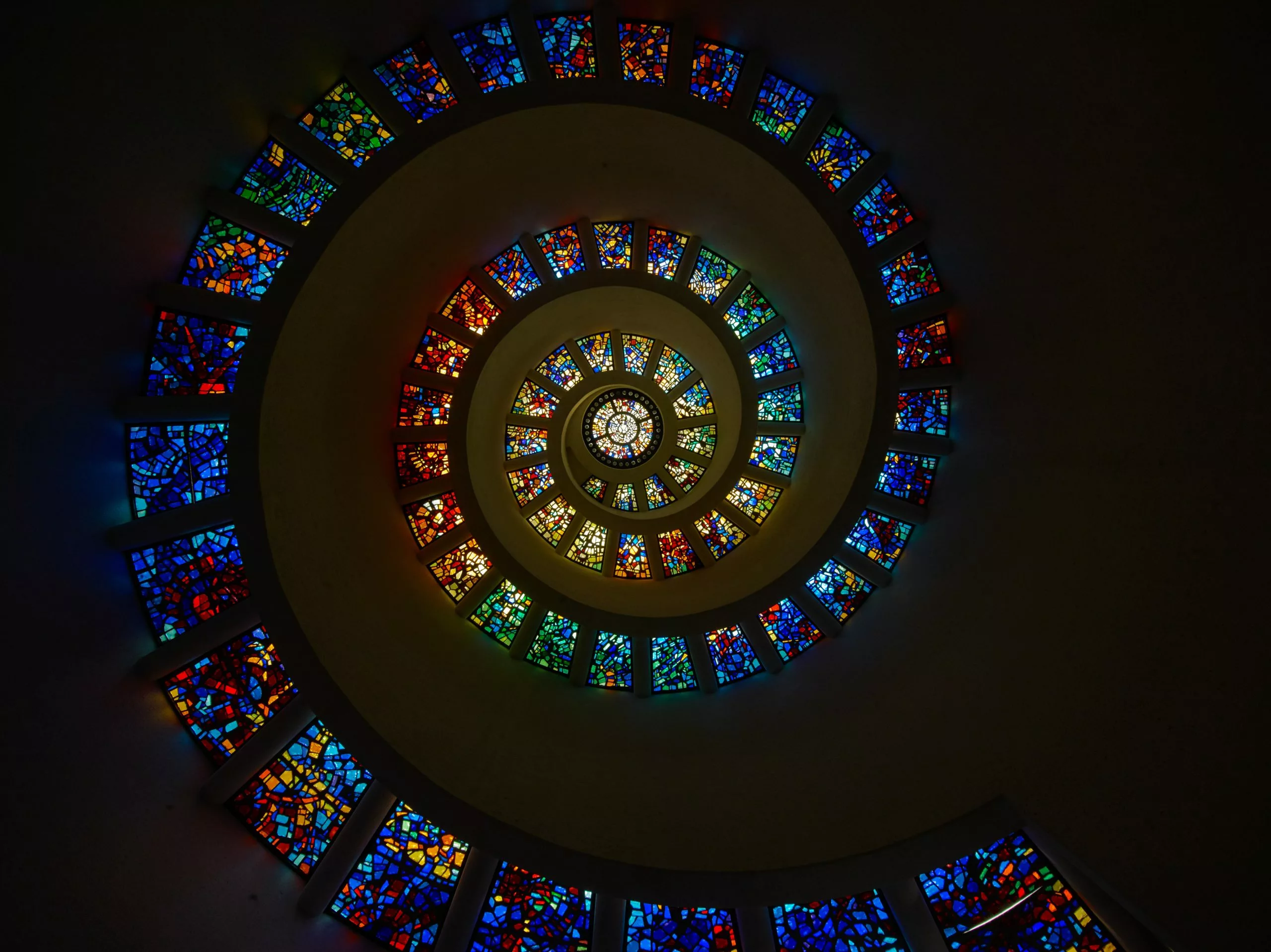 The Glory Window inside a chapel at Thanks Giving Square in Dallas Texas